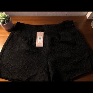Formal black shorts,with a beautiful design.